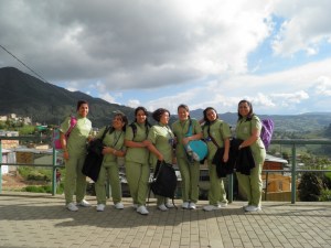 a group of beauty school students stop by to check on the progress.