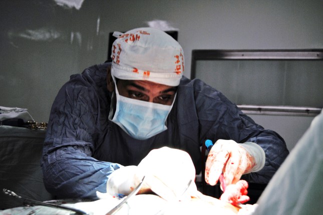 Dr. Meza, closing the chest