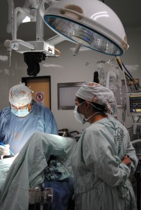 Dr. Suarez observes her patient during surgery. (photo edited to preserve patient's privacy)