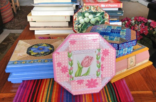 Some of the wooden boxes designed by Isabella Klein