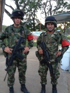 Miguel (forefront) from the Colombian military patrols La Macarena